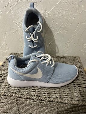Nike Women’s Light Blue Mesh Sneakers with White Swoosh